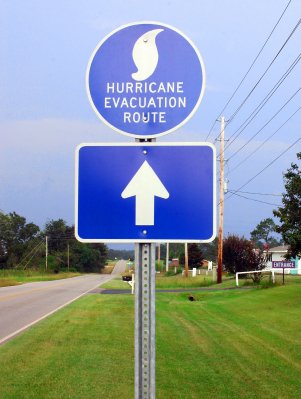 a hurricane evacuation sign - know your evacution routes beforehand